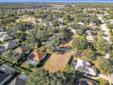 Build your dream home on this large residential lot in the on Harbor Hills Country Club in Florida - for sale on GolfHomes.com, golf home, golf lot