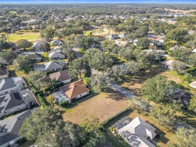 Build your dream home on this large residential lot in the on Harbor Hills Country Club in Florida - for sale on GolfHomes.com, golf home, golf lot