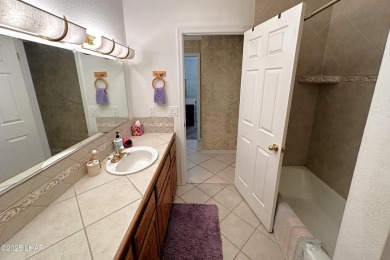 Spacious golf course home on the fairway with pool and spa on London Bridge Golf Course in Arizona - for sale on GolfHomes.com, golf home, golf lot
