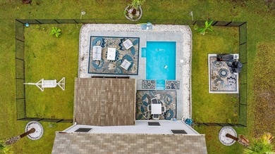 Experience resort-style living in this contemporary 5 bedroom, 3 on Palmetto Greens Golf and Country Club in South Carolina - for sale on GolfHomes.com, golf home, golf lot