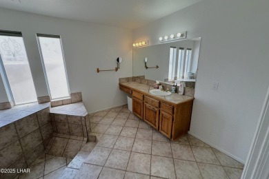 Spacious golf course home on the fairway with pool and spa on London Bridge Golf Course in Arizona - for sale on GolfHomes.com, golf home, golf lot