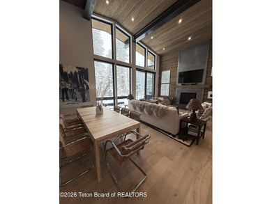 Discover mountain living at its finest at 15465 Tall Timber Rd on Snake River Sporting Club in Wyoming - for sale on GolfHomes.com, golf home, golf lot