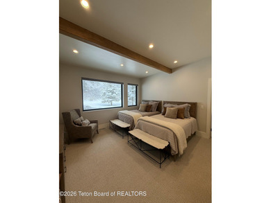 Discover mountain living at its finest at 15465 Tall Timber Rd on Snake River Sporting Club in Wyoming - for sale on GolfHomes.com, golf home, golf lot