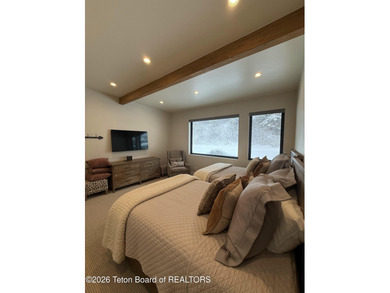 Discover mountain living at its finest at 15465 Tall Timber Rd on Snake River Sporting Club in Wyoming - for sale on GolfHomes.com, golf home, golf lot