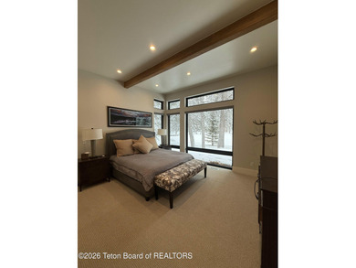 Discover mountain living at its finest at 15465 Tall Timber Rd on Snake River Sporting Club in Wyoming - for sale on GolfHomes.com, golf home, golf lot