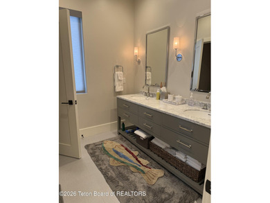 Discover mountain living at its finest at 15465 Tall Timber Rd on Snake River Sporting Club in Wyoming - for sale on GolfHomes.com, golf home, golf lot