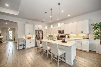 Embrace the epitome of luxury living in this exquisite home with on The Golf Club At Magnolia Landing in Florida - for sale on GolfHomes.com, golf home, golf lot