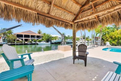 Embrace the laid back charm of the Florida Keys with this on Key Colony Beach Golf Course in Florida - for sale on GolfHomes.com, golf home, golf lot