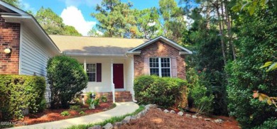 Single story living tucked away amidst mature crepe myrtle & on Seven Lakes Country Club in North Carolina - for sale on GolfHomes.com, golf home, golf lot