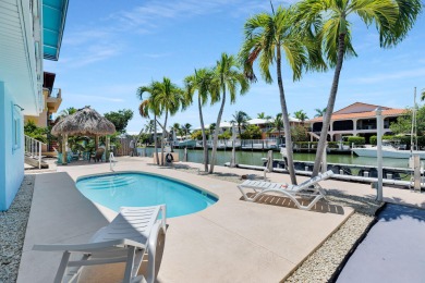 Embrace the laid back charm of the Florida Keys with this on Key Colony Beach Golf Course in Florida - for sale on GolfHomes.com, golf home, golf lot