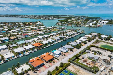 Embrace the laid back charm of the Florida Keys with this on Key Colony Beach Golf Course in Florida - for sale on GolfHomes.com, golf home, golf lot