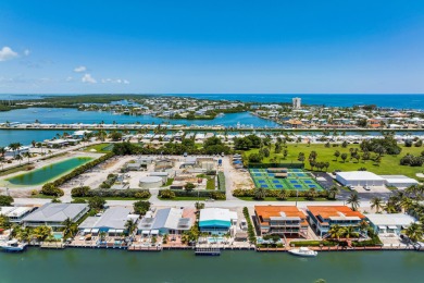 Embrace the laid back charm of the Florida Keys with this on Key Colony Beach Golf Course in Florida - for sale on GolfHomes.com, golf home, golf lot