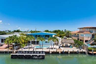 Embrace the laid back charm of the Florida Keys with this on Key Colony Beach Golf Course in Florida - for sale on GolfHomes.com, golf home, golf lot