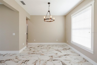 One or more photos have been virtually staged.  NEW CONSTRUCTION on Oyster Creek Golf Club in Florida - for sale on GolfHomes.com, golf home, golf lot