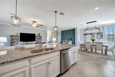 Welcome to this RARELY AVAILABLE OPEN FLOORPLAN upstairs coach on Lakewood National Golf Club in Florida - for sale on GolfHomes.com, golf home, golf lot