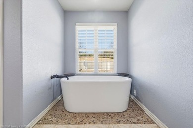 This beautifully updated Alma home offers a refined blend of on Eagle Crest Golf Course in Arkansas - for sale on GolfHomes.com, golf home, golf lot