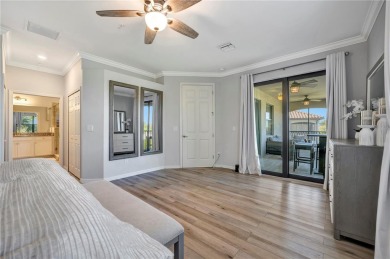 Welcome to this RARELY AVAILABLE OPEN FLOORPLAN upstairs coach on Lakewood National Golf Club in Florida - for sale on GolfHomes.com, golf home, golf lot