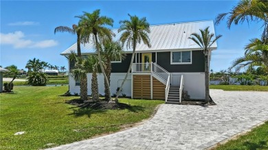 Welcome to this newly renovated luxury lakeside retreat on The Dunes Golf and Tennis Club in Florida - for sale on GolfHomes.com, golf home, golf lot