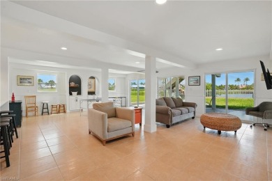 Welcome to this newly renovated luxury lakeside retreat on The Dunes Golf and Tennis Club in Florida - for sale on GolfHomes.com, golf home, golf lot