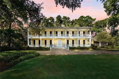 Situated on two lots with nearly an acre of land in one of the on Country Club of Mobile in Alabama - for sale on GolfHomes.com, golf home, golf lot
