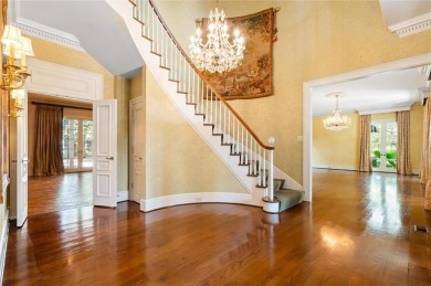 Situated on two lots with nearly an acre of land in one of the on Country Club of Mobile in Alabama - for sale on GolfHomes.com, golf home, golf lot