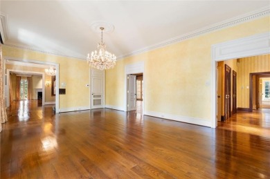 Situated on two lots with nearly an acre of land in one of the on Country Club of Mobile in Alabama - for sale on GolfHomes.com, golf home, golf lot