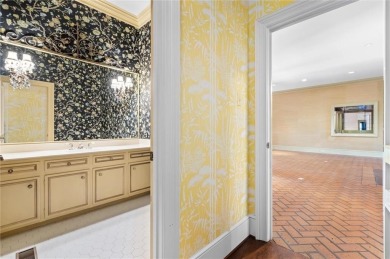 Situated on two lots with nearly an acre of land in one of the on Country Club of Mobile in Alabama - for sale on GolfHomes.com, golf home, golf lot