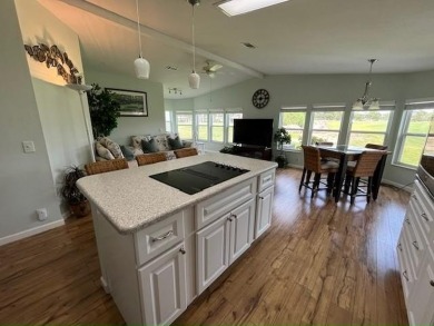 This beautiful stucco Casa Grande 2bd/2ba + Family room home is on Del Tura Golf and Country Club in Florida - for sale on GolfHomes.com, golf home, golf lot