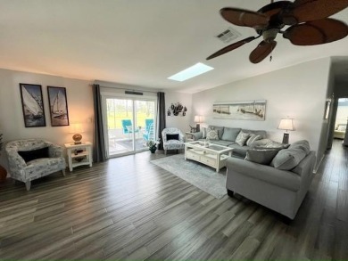 Beautifully updated 2bd/2ba coastal-inspired home. Featuring on Del Tura Golf and Country Club in Florida - for sale on GolfHomes.com, golf home, golf lot