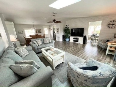 Beautifully updated 2bd/2ba coastal-inspired home. Featuring on Del Tura Golf and Country Club in Florida - for sale on GolfHomes.com, golf home, golf lot