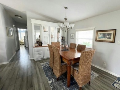 Beautifully updated 2bd/2ba coastal-inspired home. Featuring on Del Tura Golf and Country Club in Florida - for sale on GolfHomes.com, golf home, golf lot