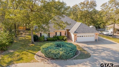 Welcome to 532 Dogwood Lane in the gated Hideaway Lake on Hide-A-Way Lake Golf Course in Texas - for sale on GolfHomes.com, golf home, golf lot