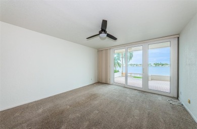 RARELY available 1st floor condo. Overlooking the intracoastal on Isla Del Sol Yacht and Country Club in Florida - for sale on GolfHomes.com, golf home, golf lot