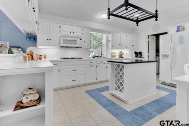 Welcome to 532 Dogwood Lane in the gated Hideaway Lake on Hide-A-Way Lake Golf Course in Texas - for sale on GolfHomes.com, golf home, golf lot