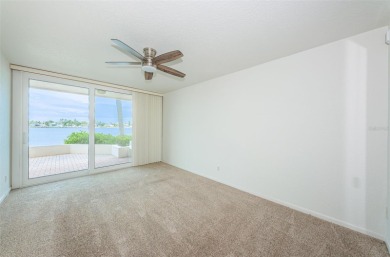 RARELY available 1st floor condo. Overlooking the intracoastal on Isla Del Sol Yacht and Country Club in Florida - for sale on GolfHomes.com, golf home, golf lot