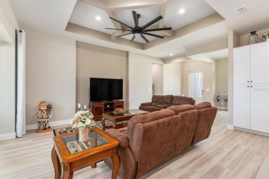 MODERN HOME Where Elegance Meets Florida Lifestyle in this on Pinemoor West Golf Club in Florida - for sale on GolfHomes.com, golf home, golf lot