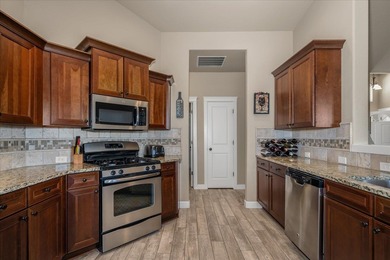 Liberty Lake view rancher! Enjoy territorial views and colorful on Trailhead At Liberty Lake in Washington - for sale on GolfHomes.com, golf home, golf lot