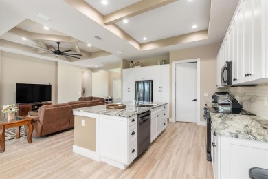MODERN HOME Where Elegance Meets Florida Lifestyle in this on Pinemoor West Golf Club in Florida - for sale on GolfHomes.com, golf home, golf lot