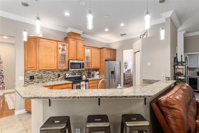 This stunning former builder's model home by Robinshore is on Haile Plantation Golf and Country Club in Florida - for sale on GolfHomes.com, golf home, golf lot