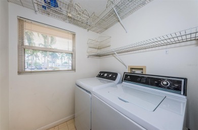 RARELY available 1st floor condo. Overlooking the intracoastal on Isla Del Sol Yacht and Country Club in Florida - for sale on GolfHomes.com, golf home, golf lot