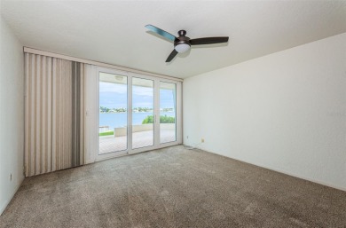 RARELY available 1st floor condo. Overlooking the intracoastal on Isla Del Sol Yacht and Country Club in Florida - for sale on GolfHomes.com, golf home, golf lot