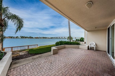 RARELY available 1st floor condo. Overlooking the intracoastal on Isla Del Sol Yacht and Country Club in Florida - for sale on GolfHomes.com, golf home, golf lot