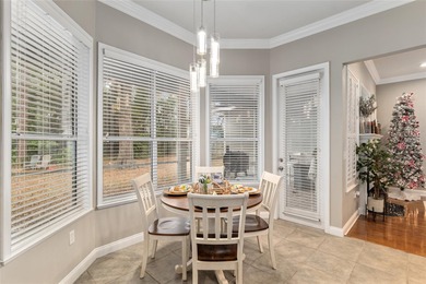 This stunning former builder's model home by Robinshore is on Haile Plantation Golf and Country Club in Florida - for sale on GolfHomes.com, golf home, golf lot