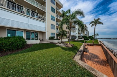 RARELY available 1st floor condo. Overlooking the intracoastal on Isla Del Sol Yacht and Country Club in Florida - for sale on GolfHomes.com, golf home, golf lot