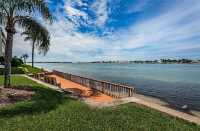 RARELY available 1st floor condo. Overlooking the intracoastal on Isla Del Sol Yacht and Country Club in Florida - for sale on GolfHomes.com, golf home, golf lot
