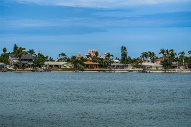 RARELY available 1st floor condo. Overlooking the intracoastal on Isla Del Sol Yacht and Country Club in Florida - for sale on GolfHomes.com, golf home, golf lot