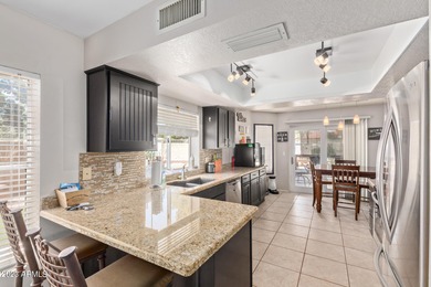 Updated 4-bedroom, 2.5-bathroom home with a 2.5-car garage on Arrowhead Country Club in Arizona - for sale on GolfHomes.com, golf home, golf lot