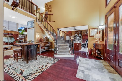 Sheathed in an exquisite brick exterior, this luxurious custom on Lakeview Golf Resort and Spa - Lakeview in West Virginia - for sale on GolfHomes.com, golf home, golf lot