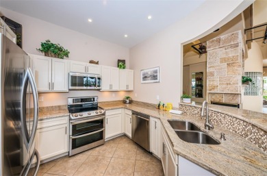 RARELY available 1st floor condo. Overlooking the intracoastal on Isla Del Sol Yacht and Country Club in Florida - for sale on GolfHomes.com, golf home, golf lot