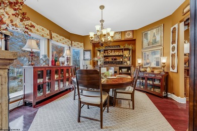 Sheathed in an exquisite brick exterior, this luxurious custom on Lakeview Golf Resort and Spa - Lakeview in West Virginia - for sale on GolfHomes.com, golf home, golf lot